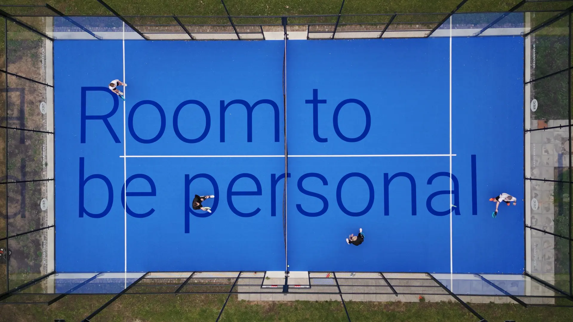 Systematic employees playing padel