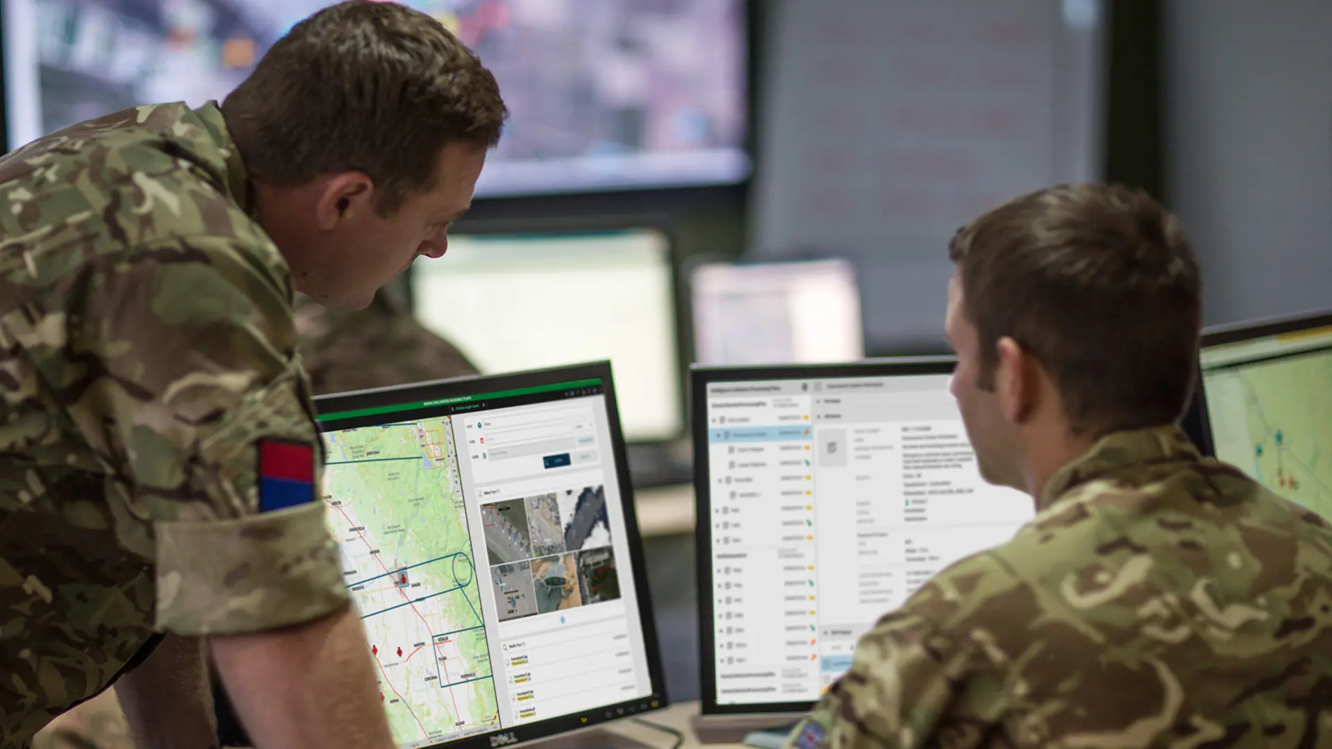 Personnel looking at screens