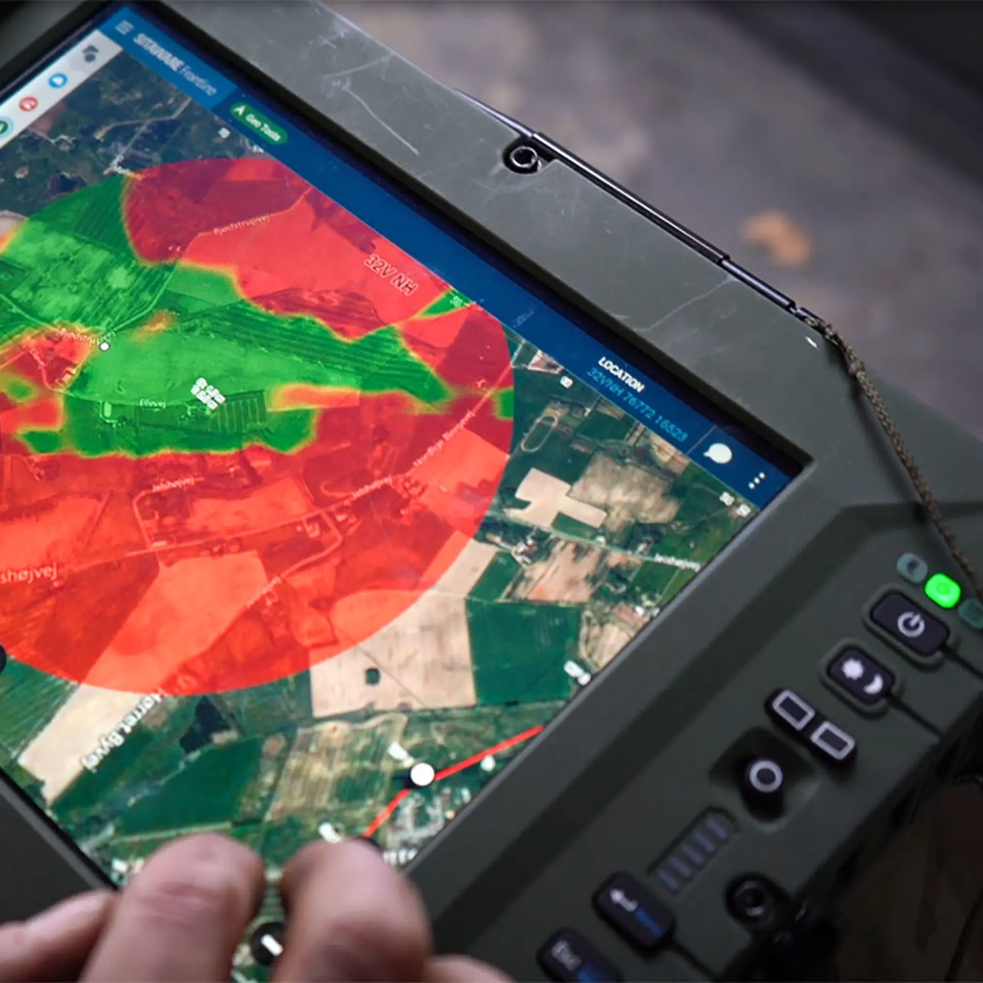 Soldier Using Sitaware Frontline In Vehicle