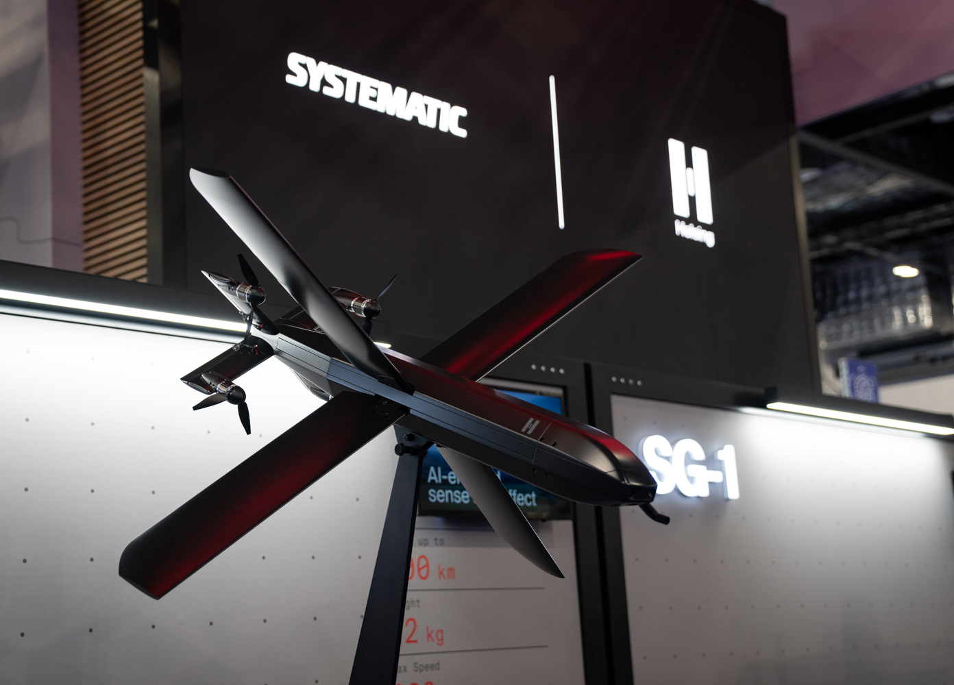 The Helsing HX-2 drone showcased on a stand at the DSEI 2025 defense trade show.