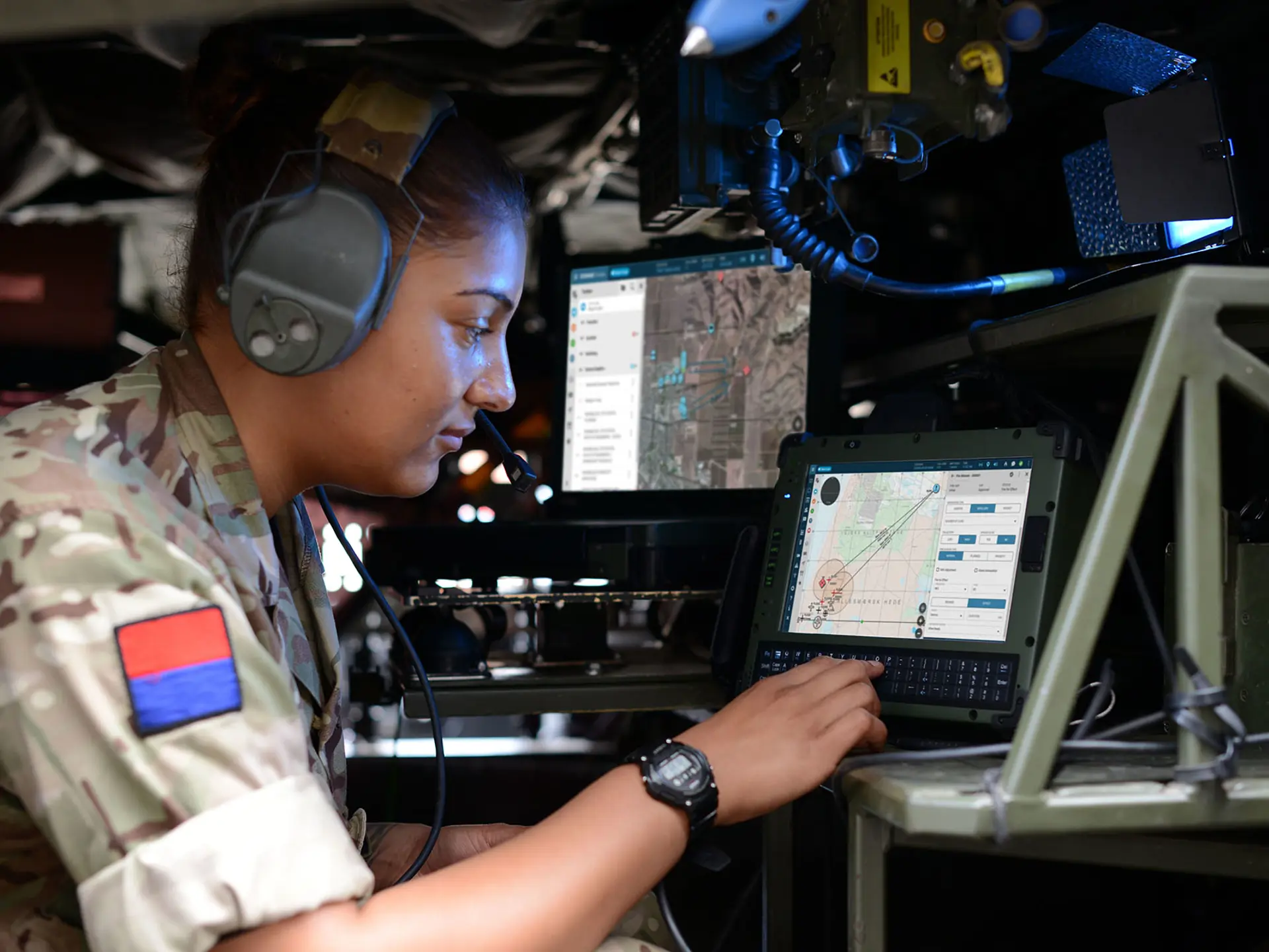 Staff Working In Sitaware Frontline In Vehicle