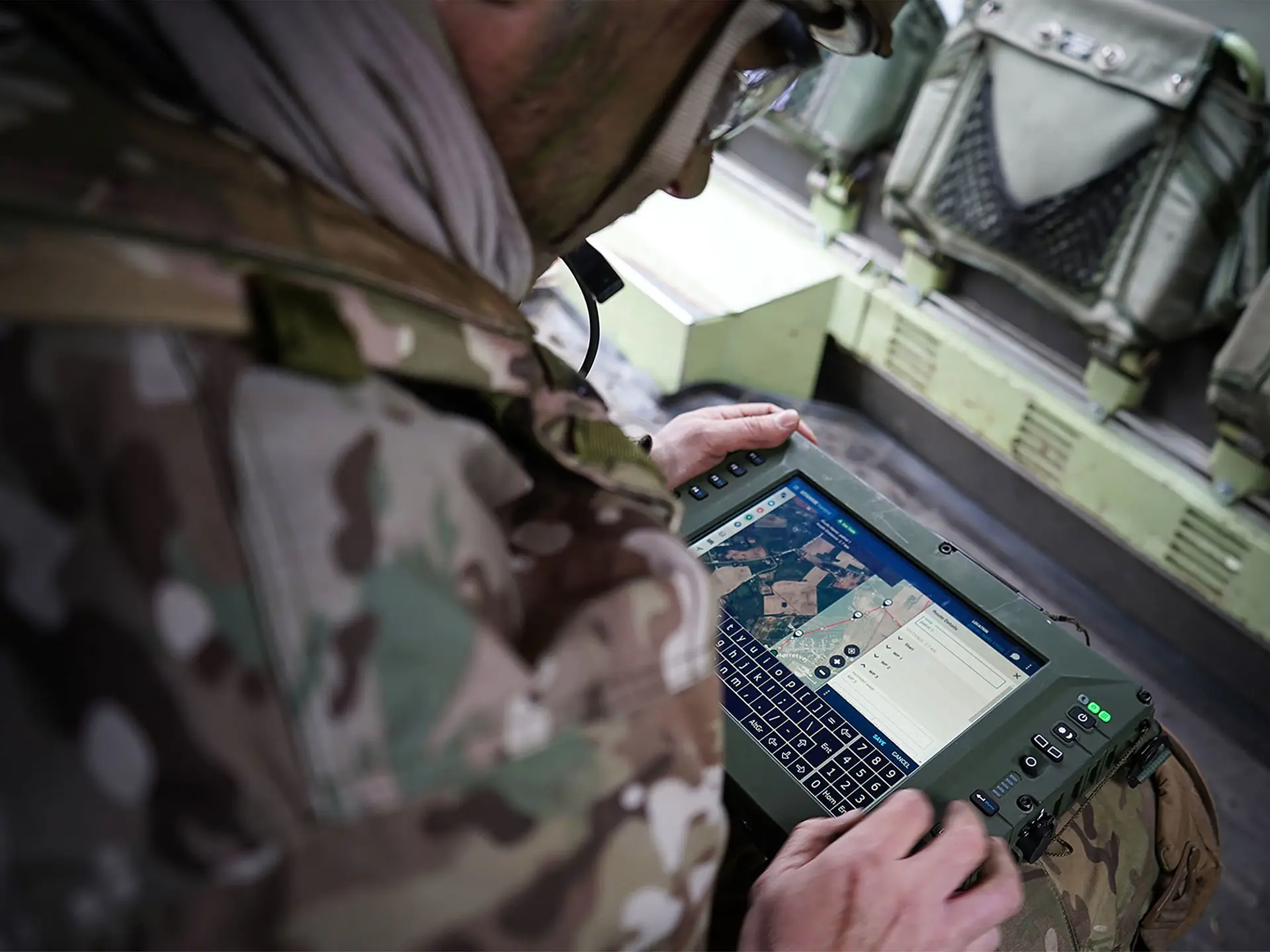 Soldier Using Sitaware Frontline In Vehicle