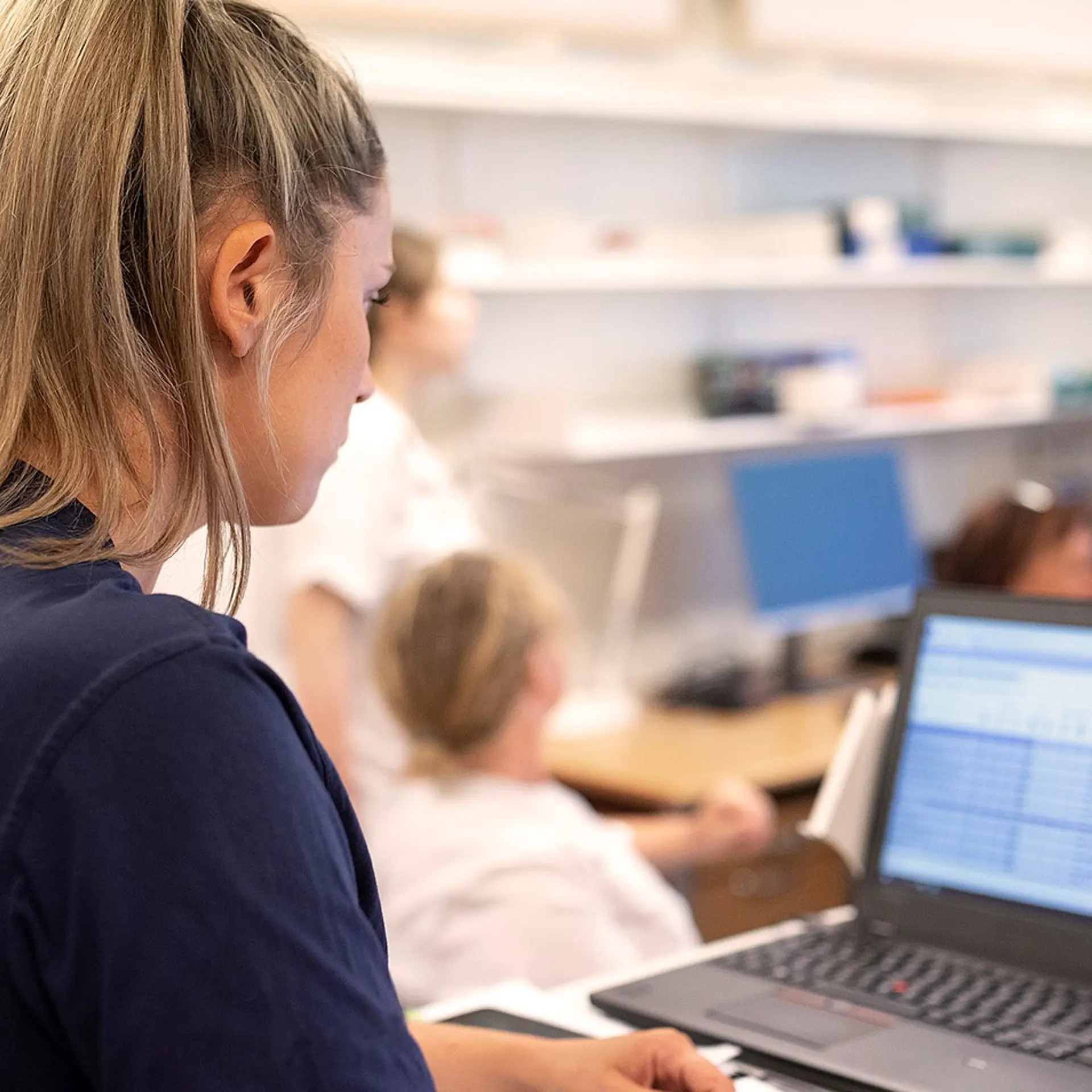 Healthcare worker looking at computer