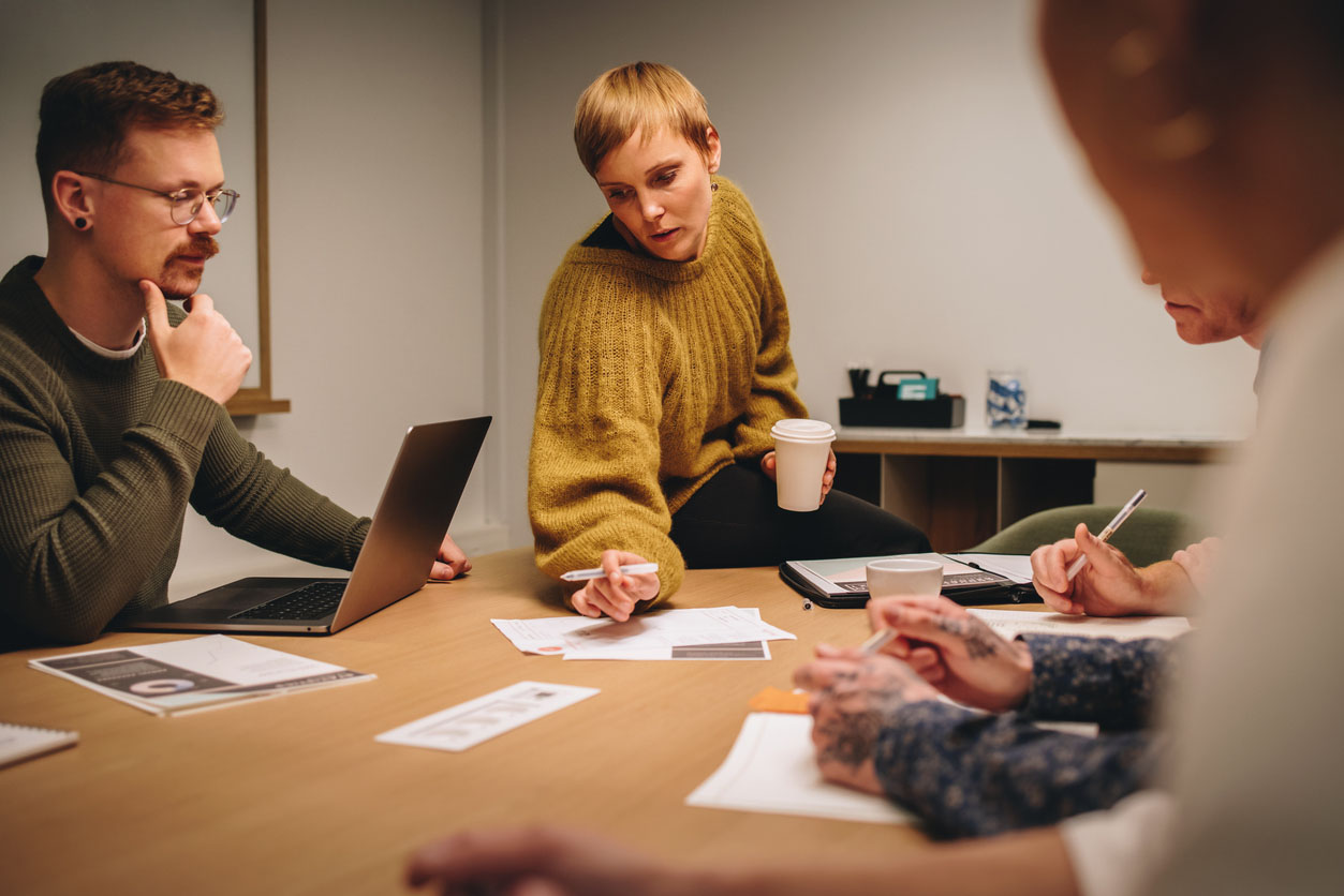People talking around a table