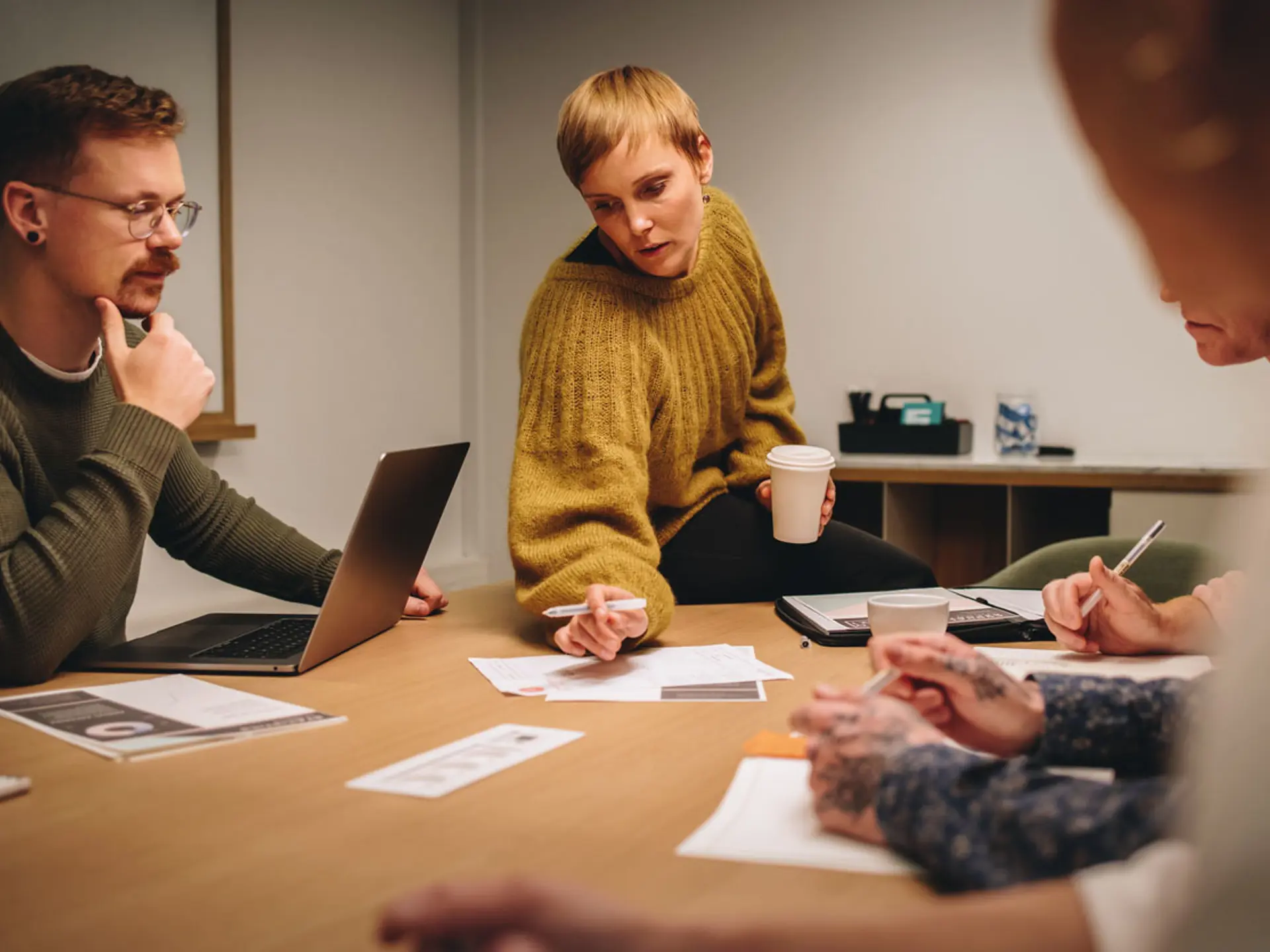 People talking around a table