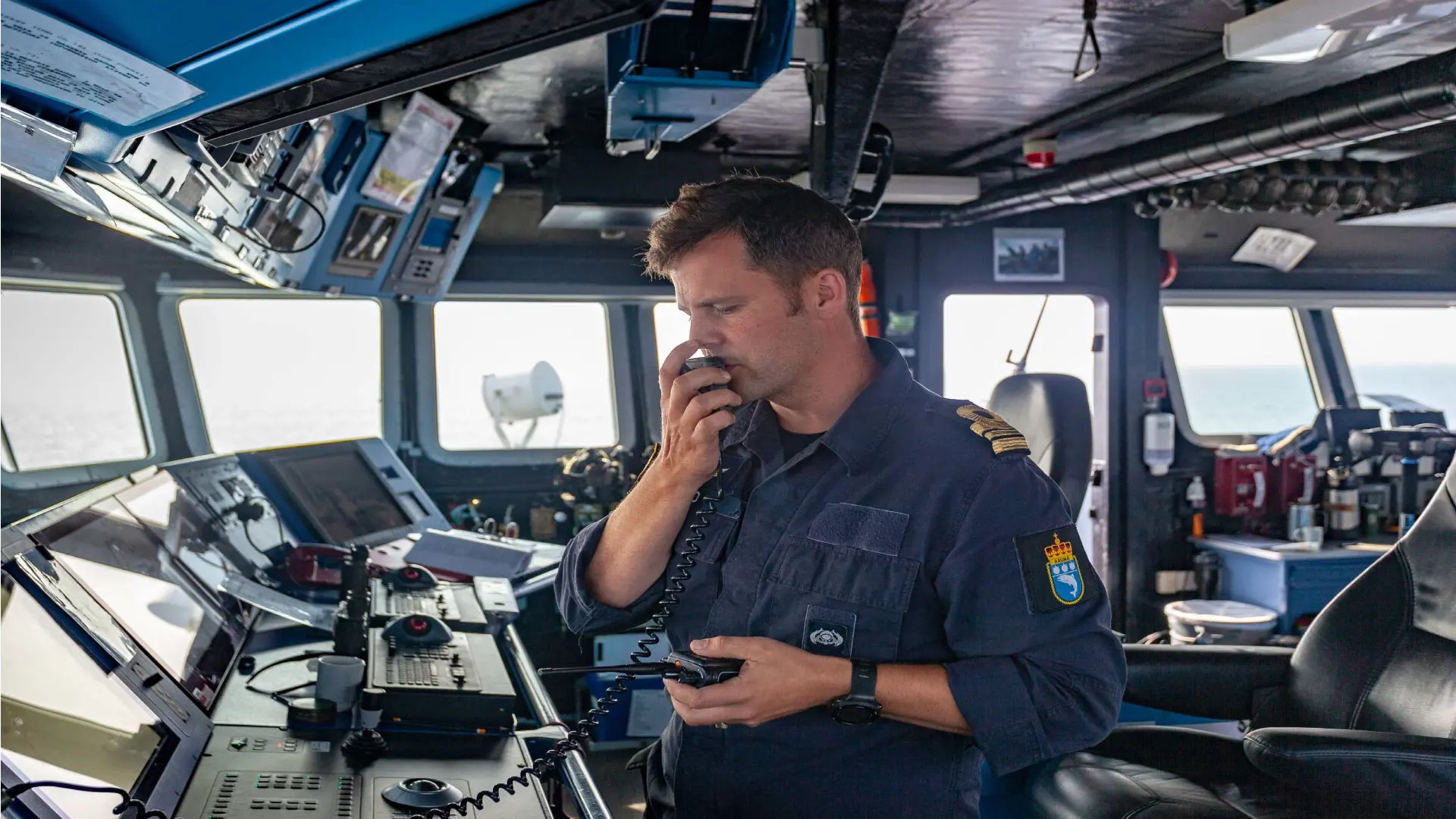 Danish Navy Officer speaking on ship radio