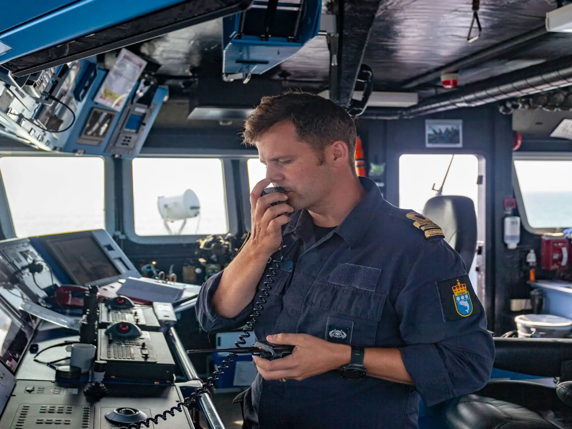 Danish Navy Officer speaking on ship radio