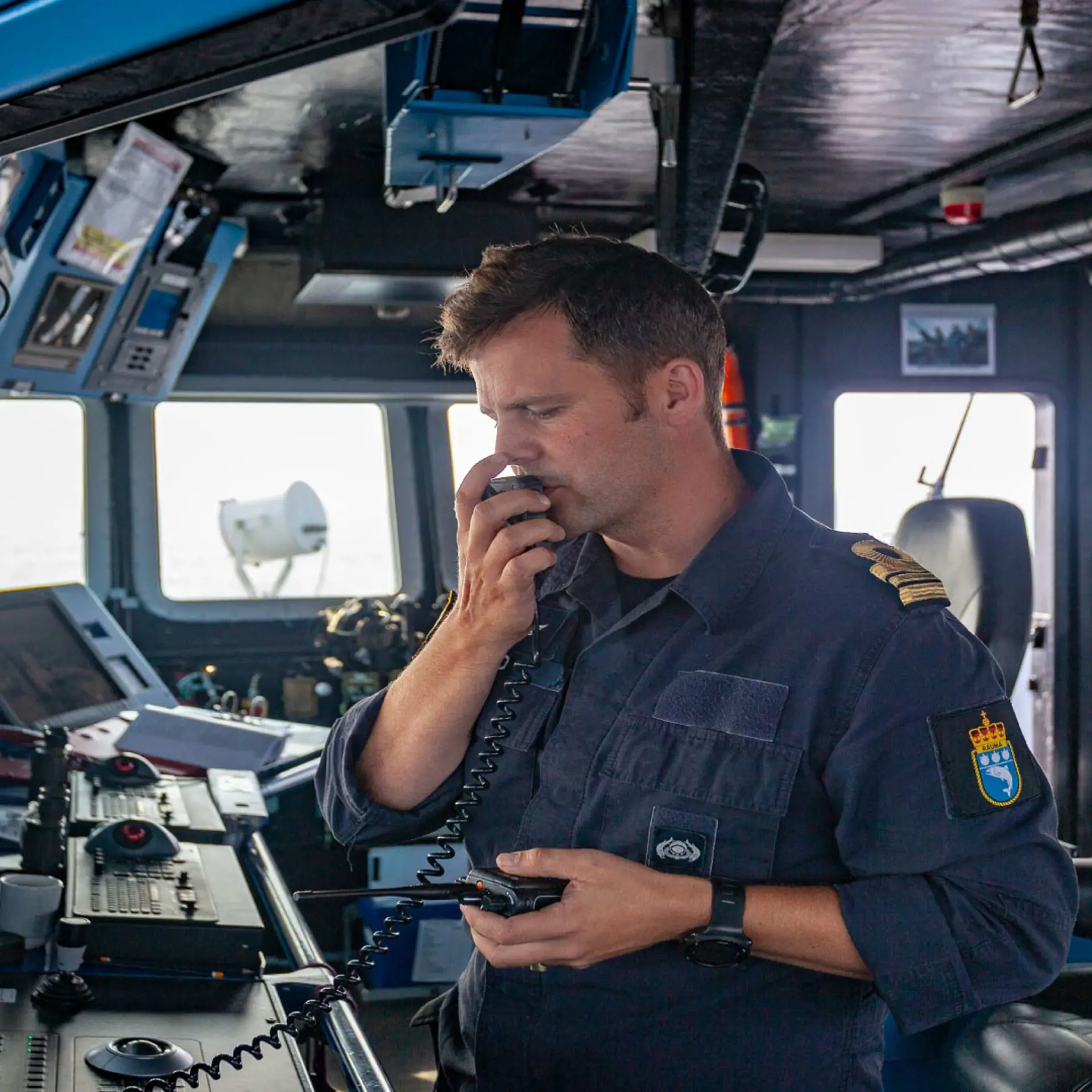 Danish Navy Officer speaking on ship radio