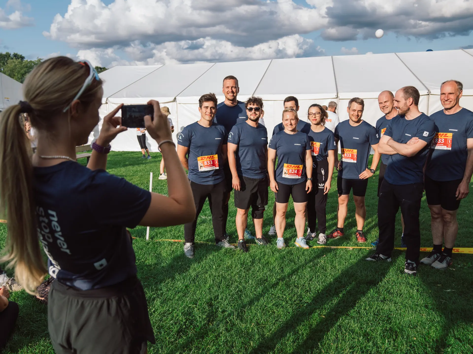 Systematic employee at social event running