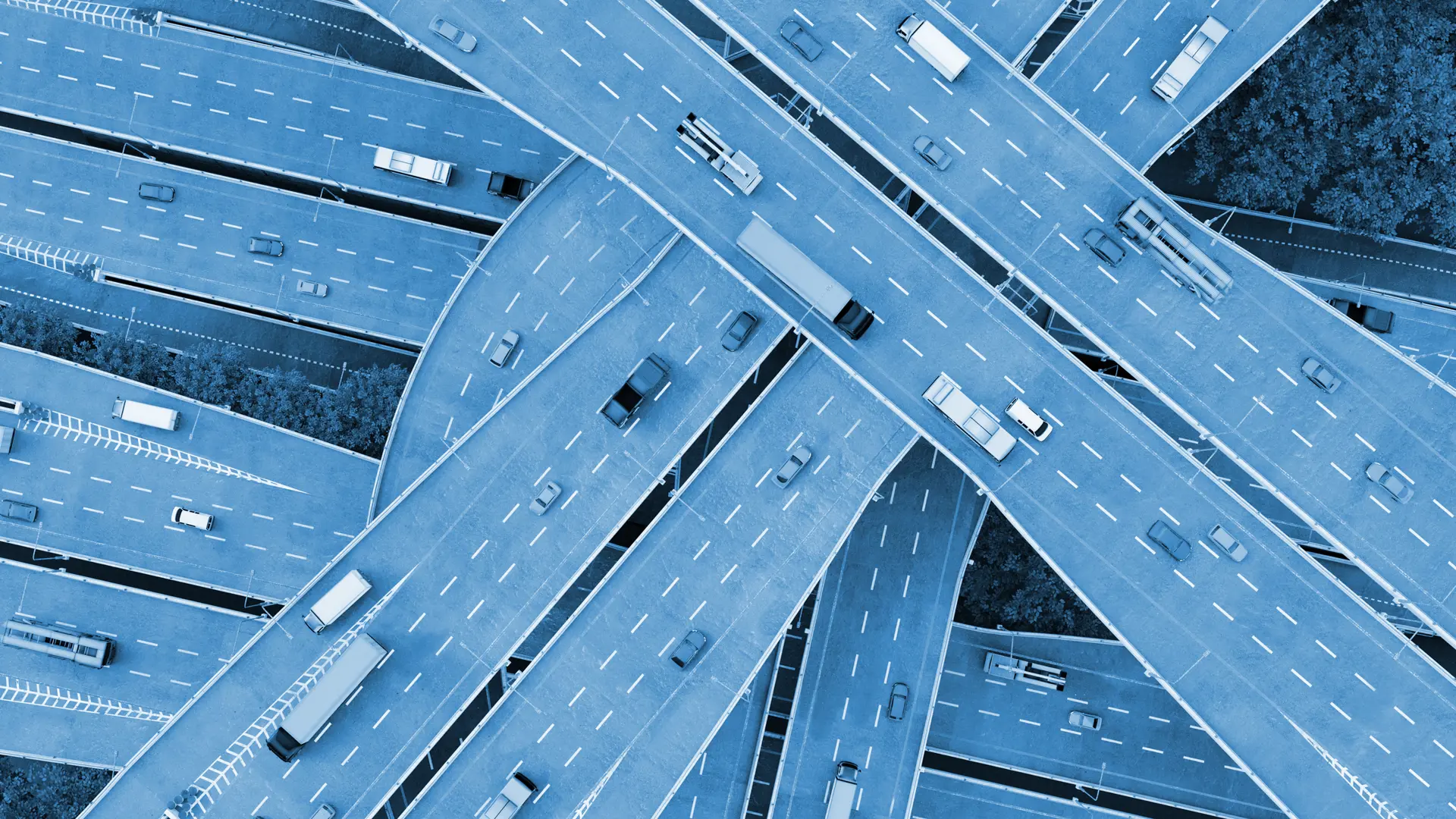 Roads crossed by cars, seen from above.