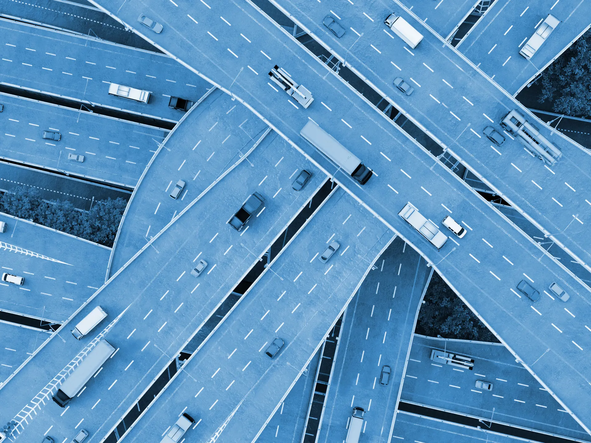 Roads crossed by cars, seen from above.