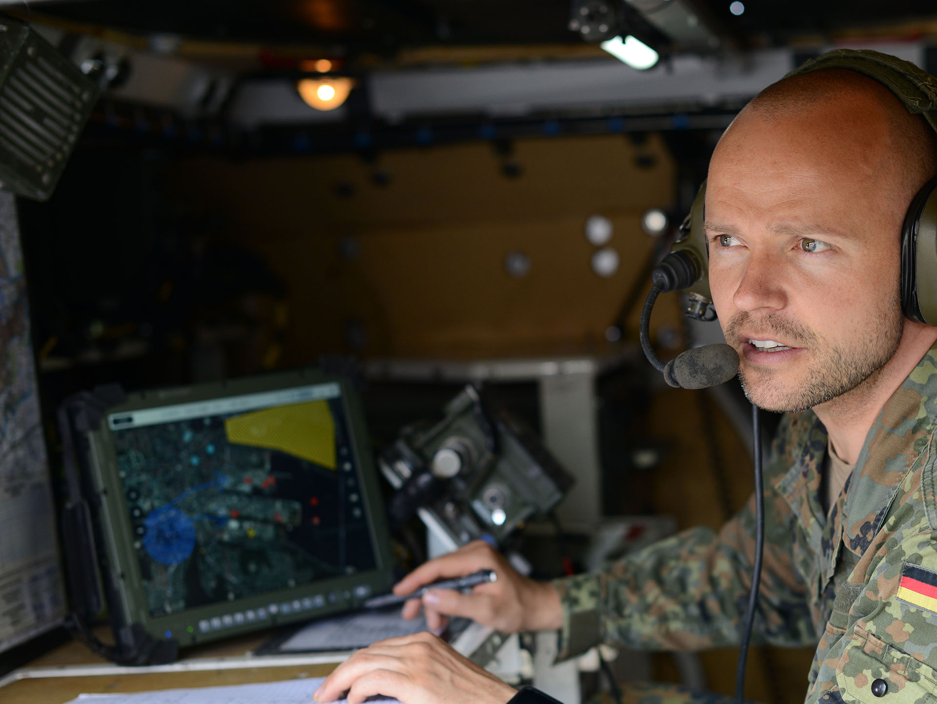 Soldier Using Sitaware Frontline In Vehicle