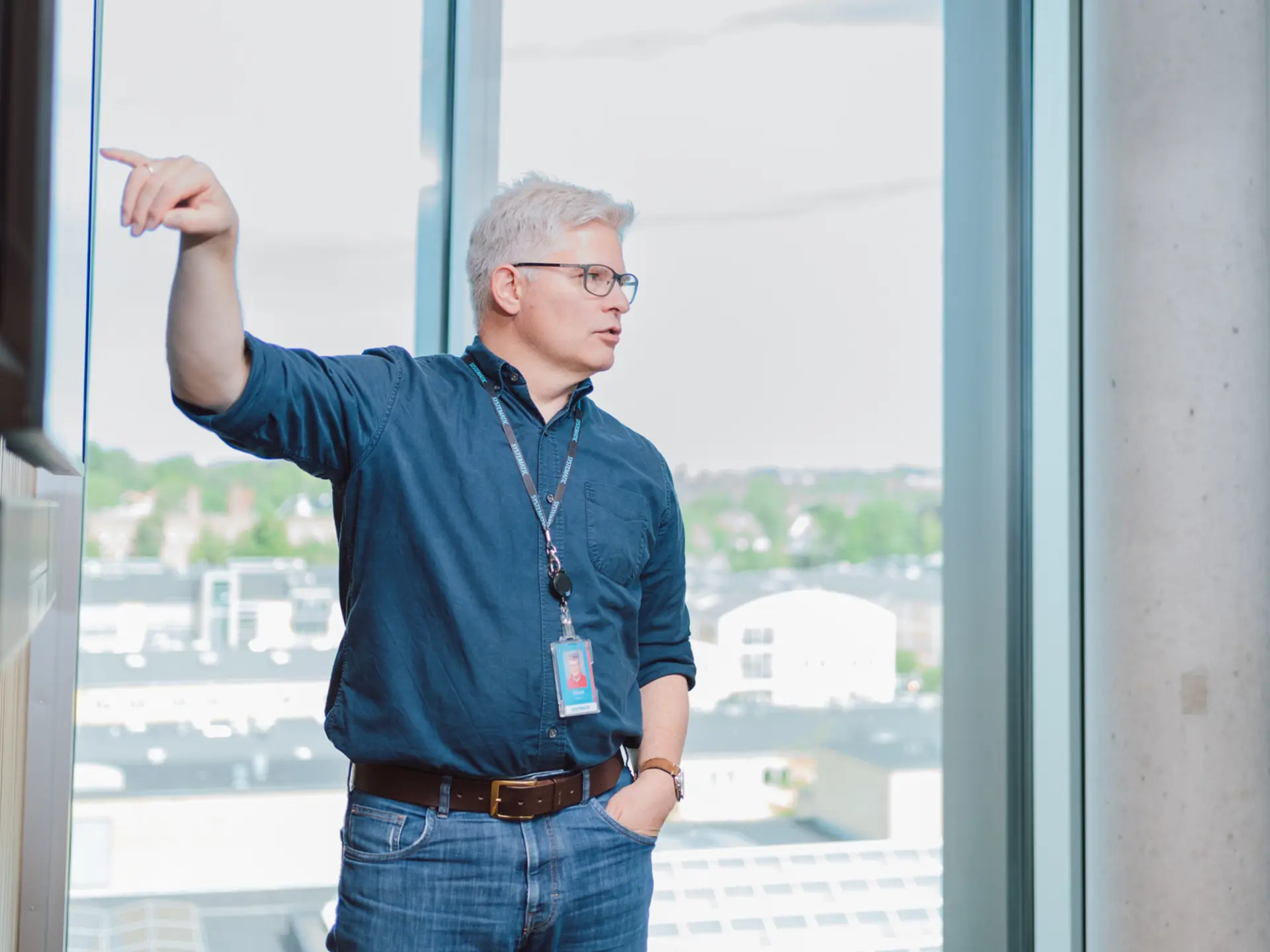 Employee presenting in meeting room