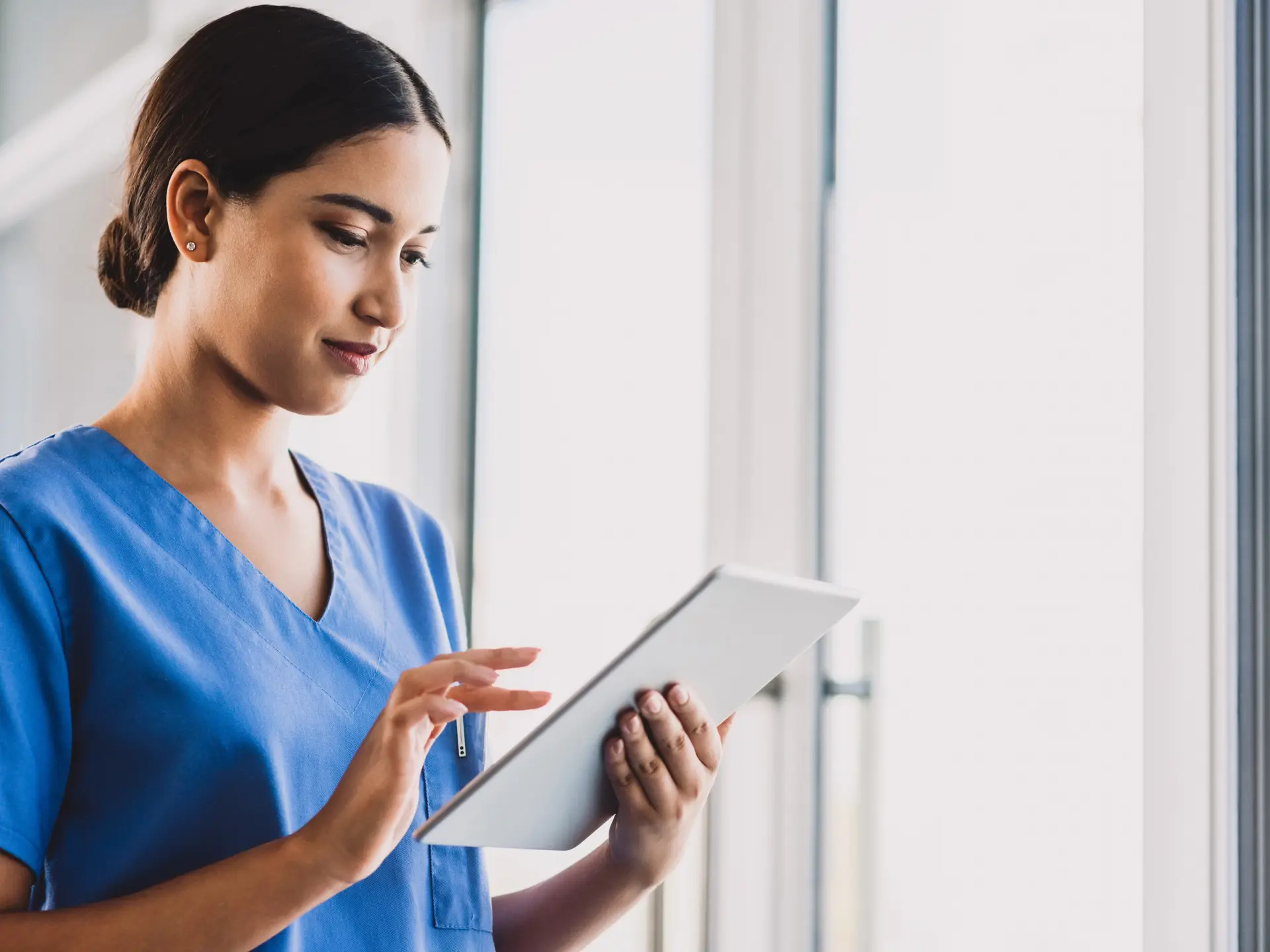 Young Nurse Using A Tablet
