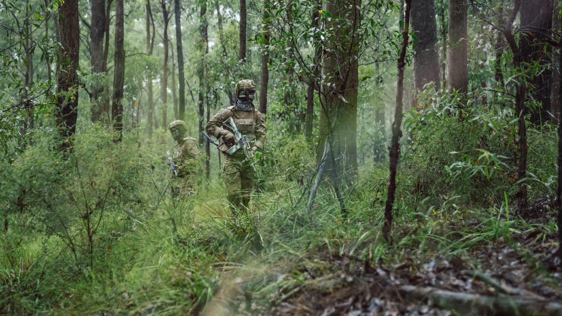 soldiers navigating in the forest