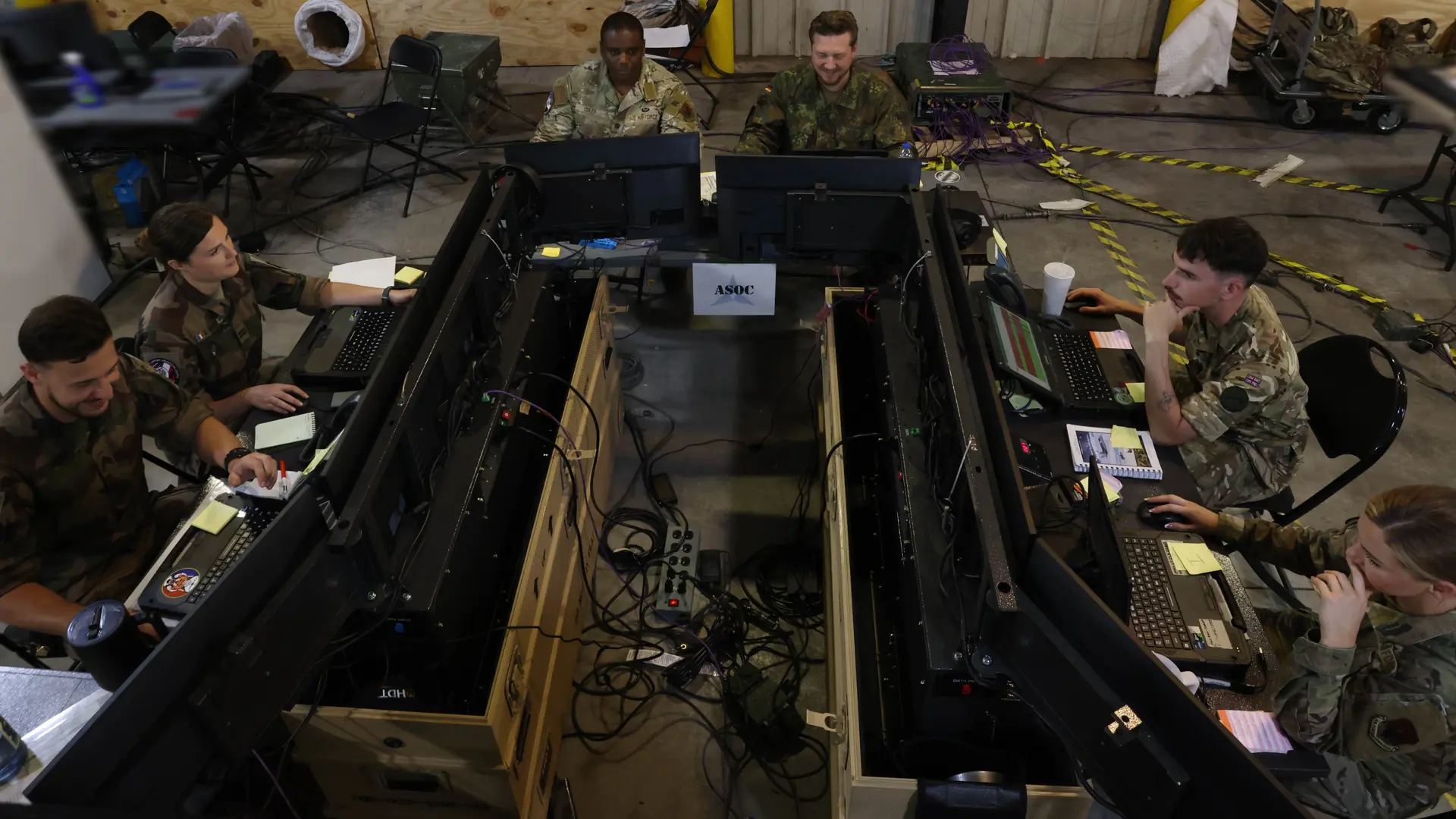 Soldiers working on computers during the WFX 25 exercise