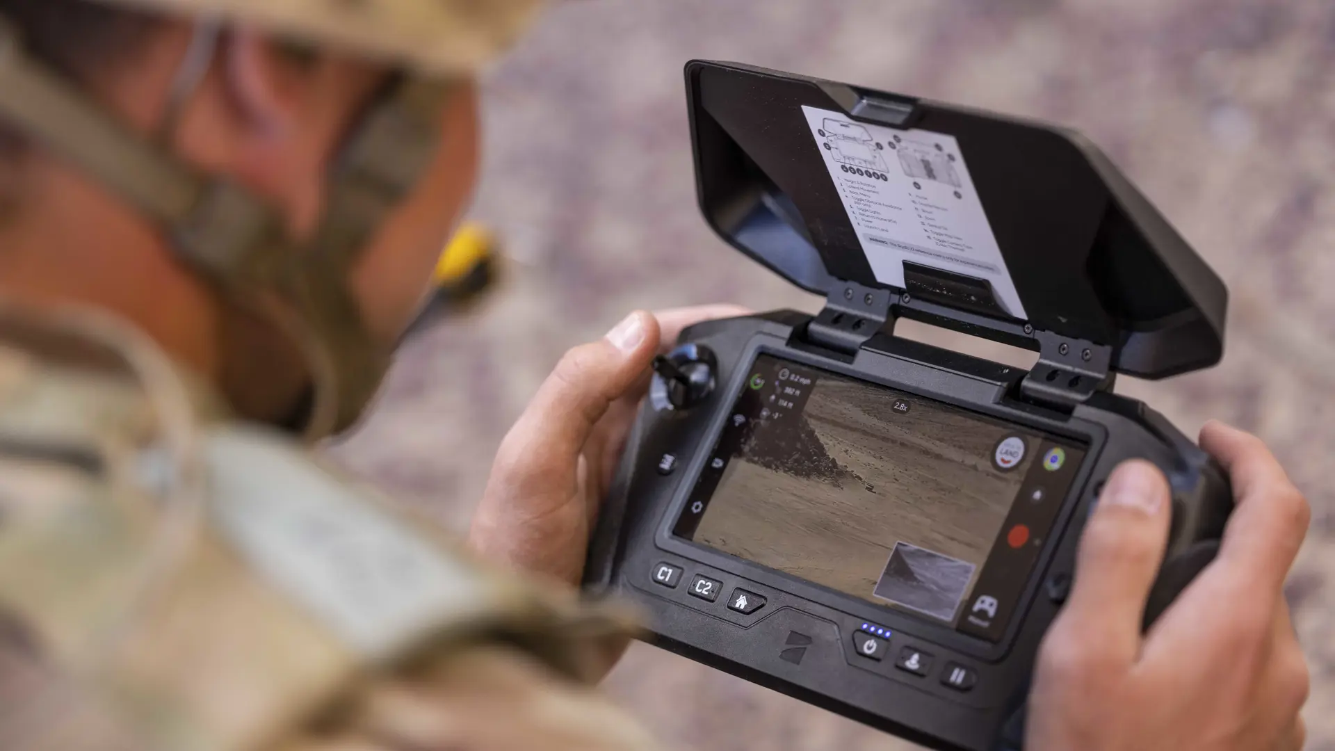 Soldier using C4ISR with SitaWare software for Project Zodiac and Project Conversion