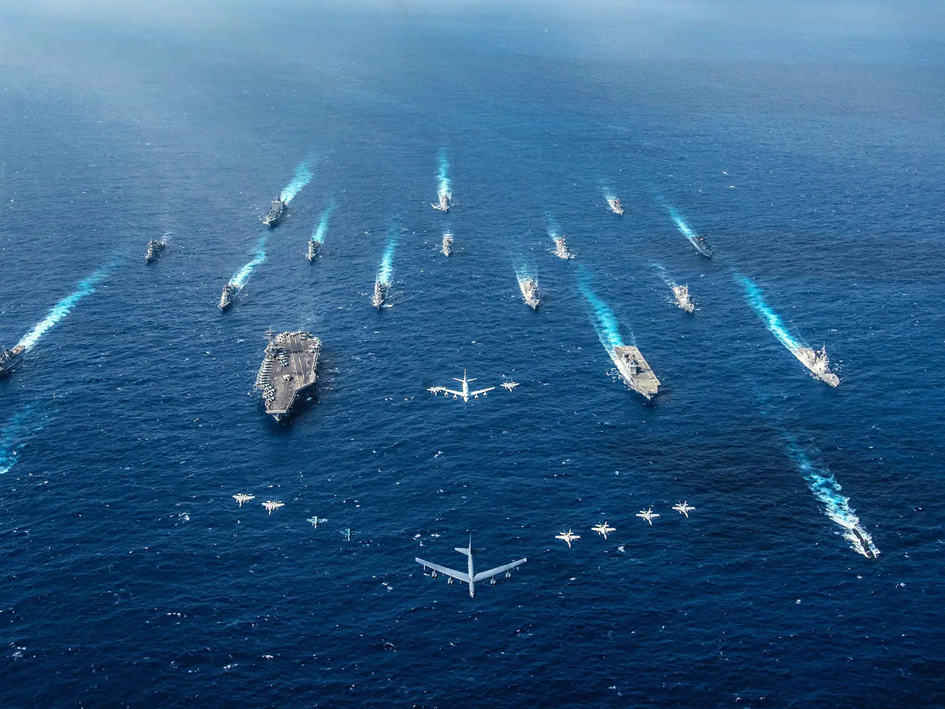 Vessels And Aircrafts From Above At Sea