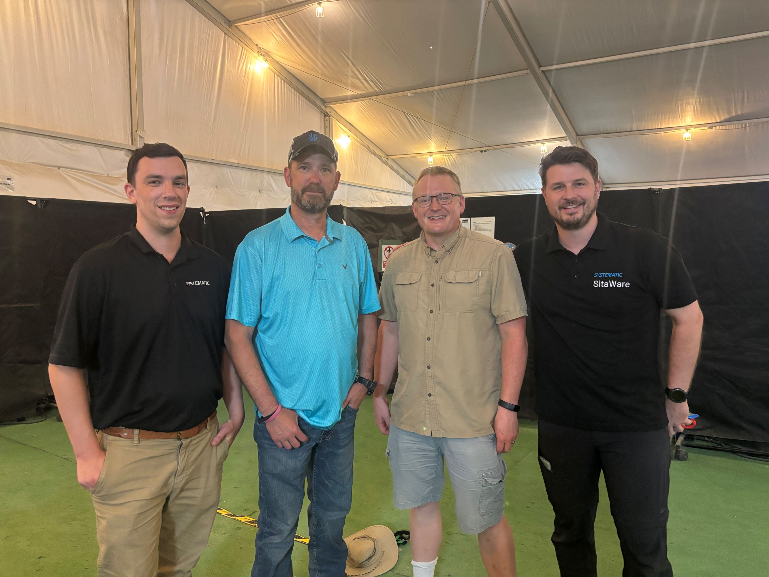 Casey Frederick, Jeff Fisher, Brian Stephens and a Systematic colleague pictured together at PC-C6.