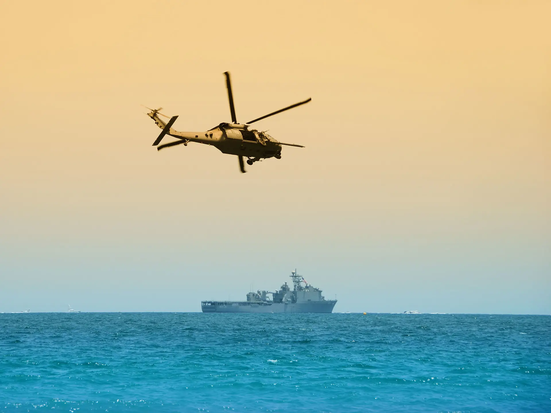 Ship And Helicopter On Open Sea in action