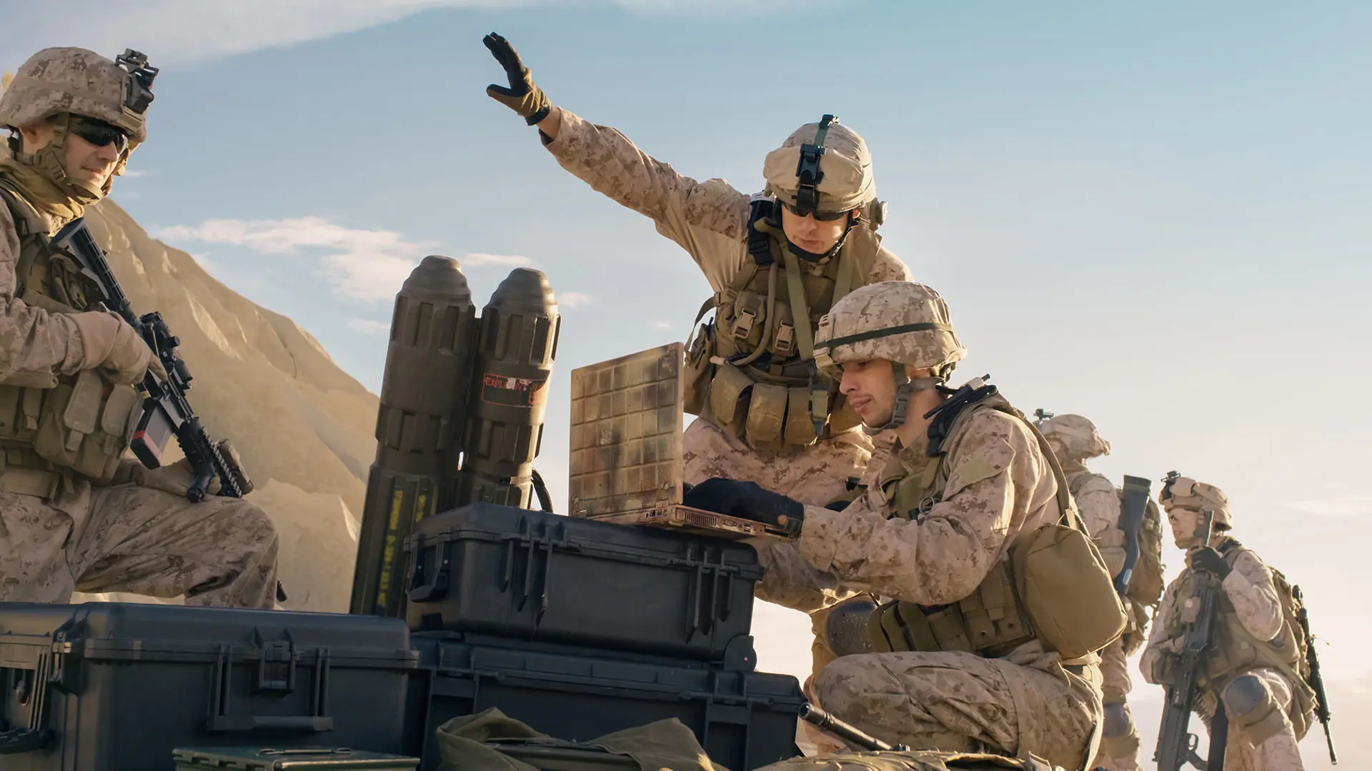 Soldiers On Laptop Doing Surveillance In Desert