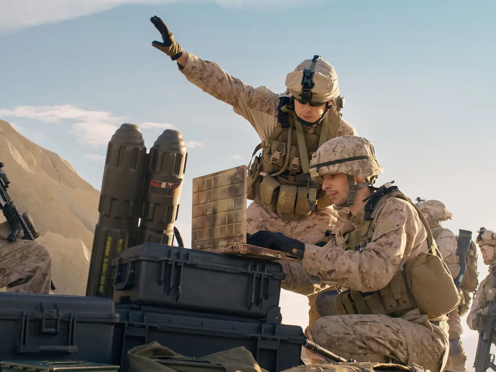 Soldiers On Laptop Doing Surveillance In Desert