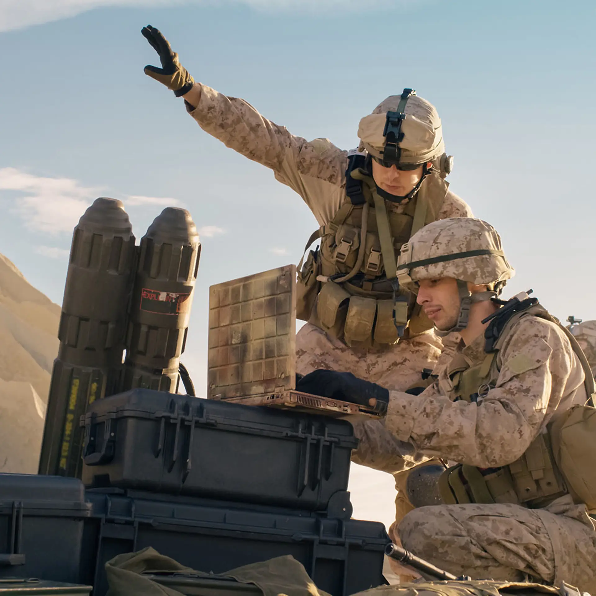 Soldiers On Laptop Doing Surveillance In Desert