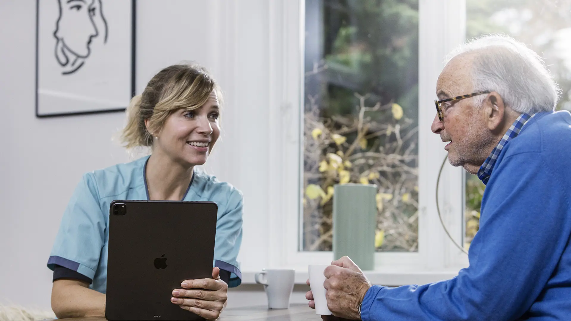 Healthcare professional visits citizens at home