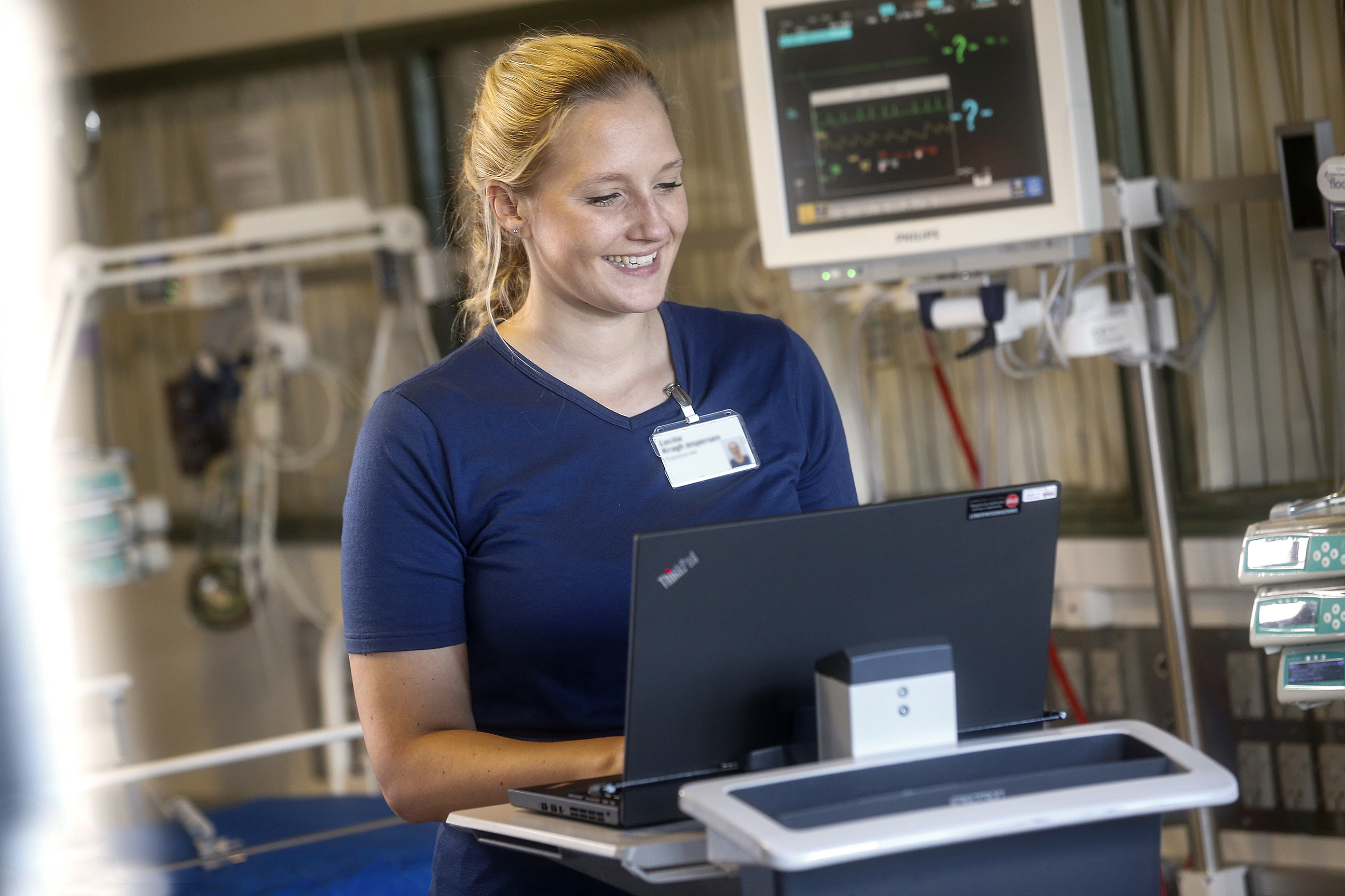 Nurse working in icu on computer