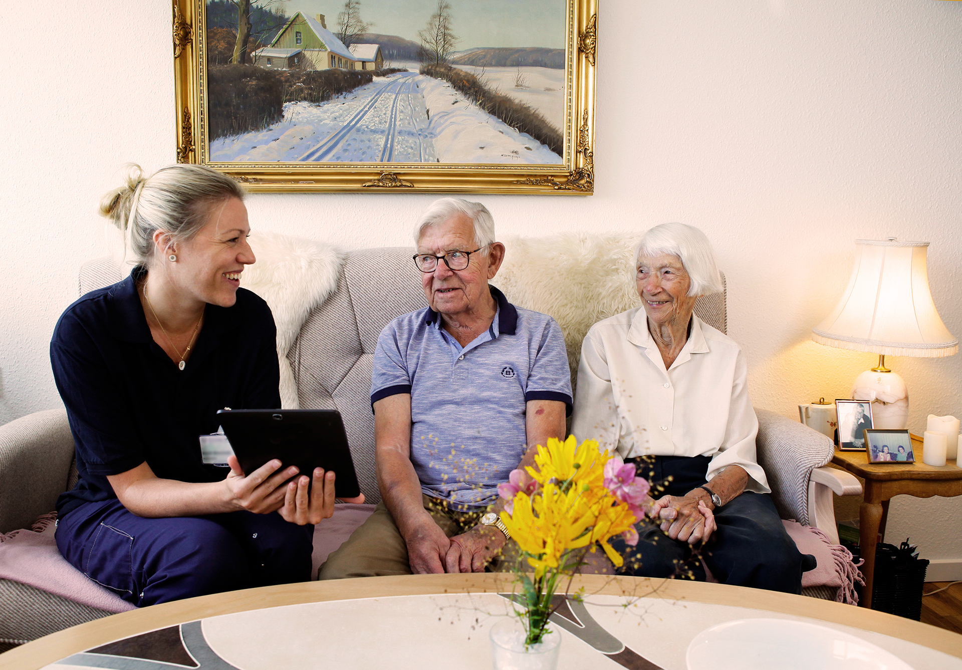 Social and health care assistant visiting elderly
