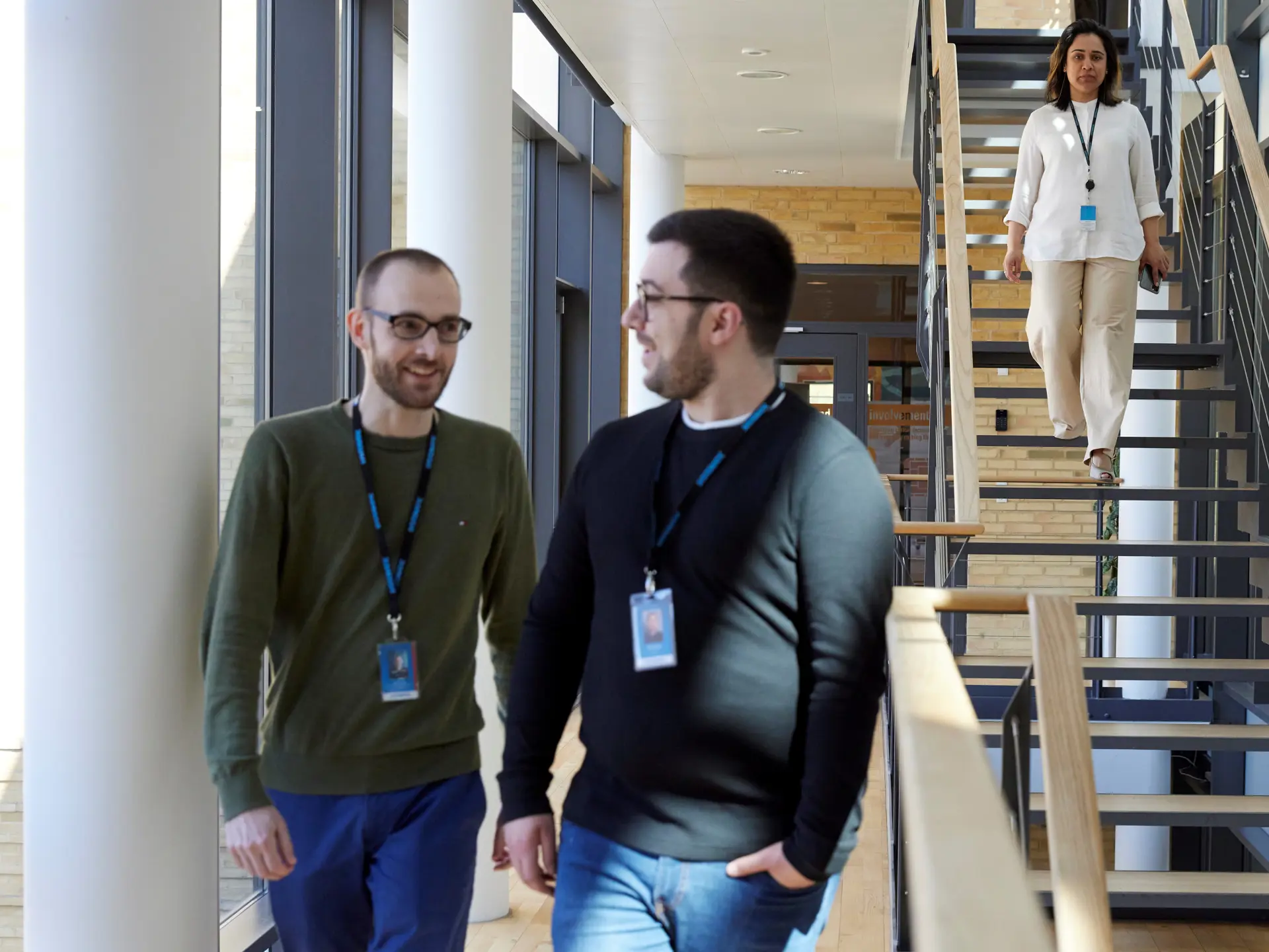 Employees walking on stairs