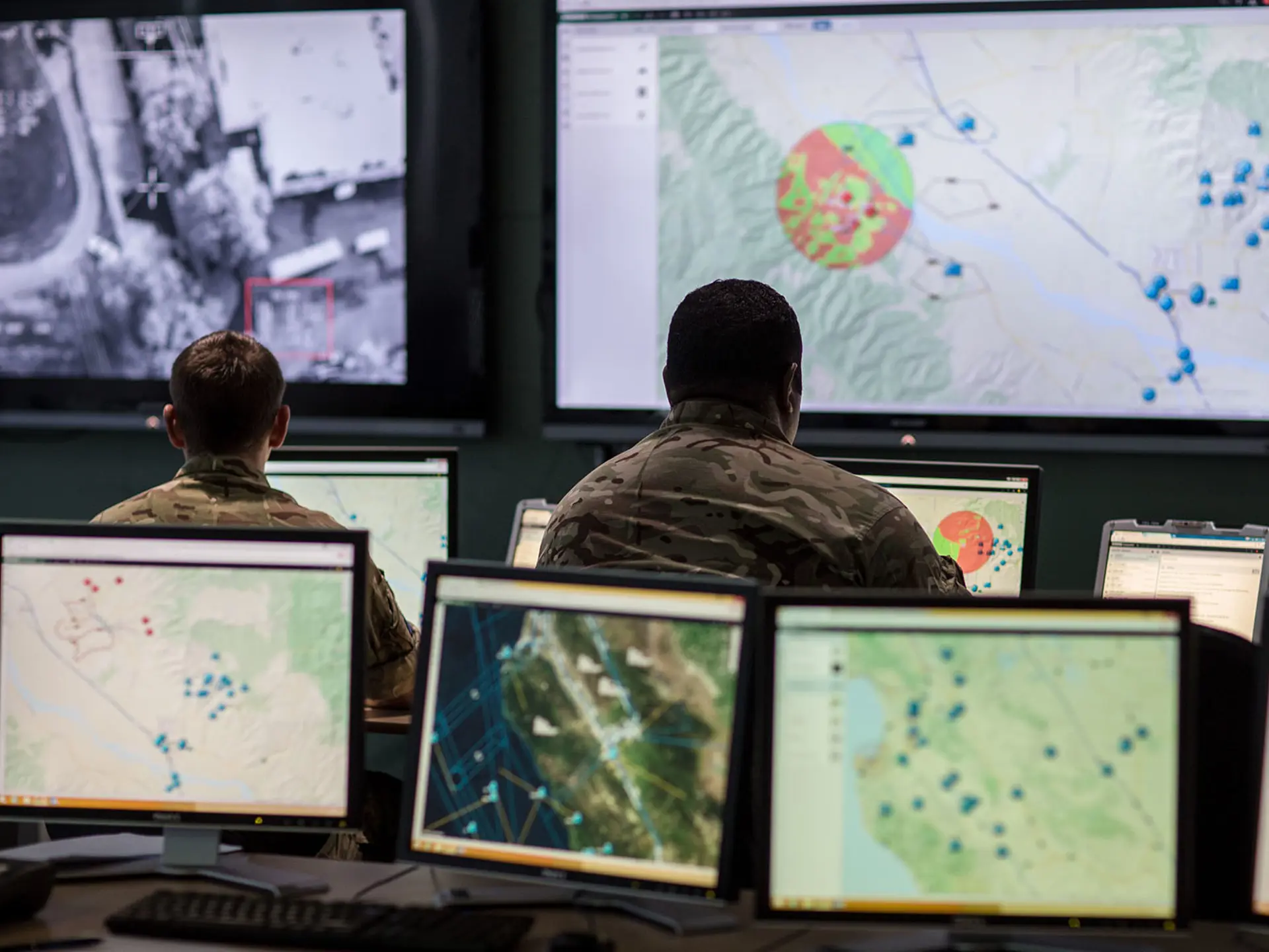 UK Commander Looking At Sitaware Map In HQ