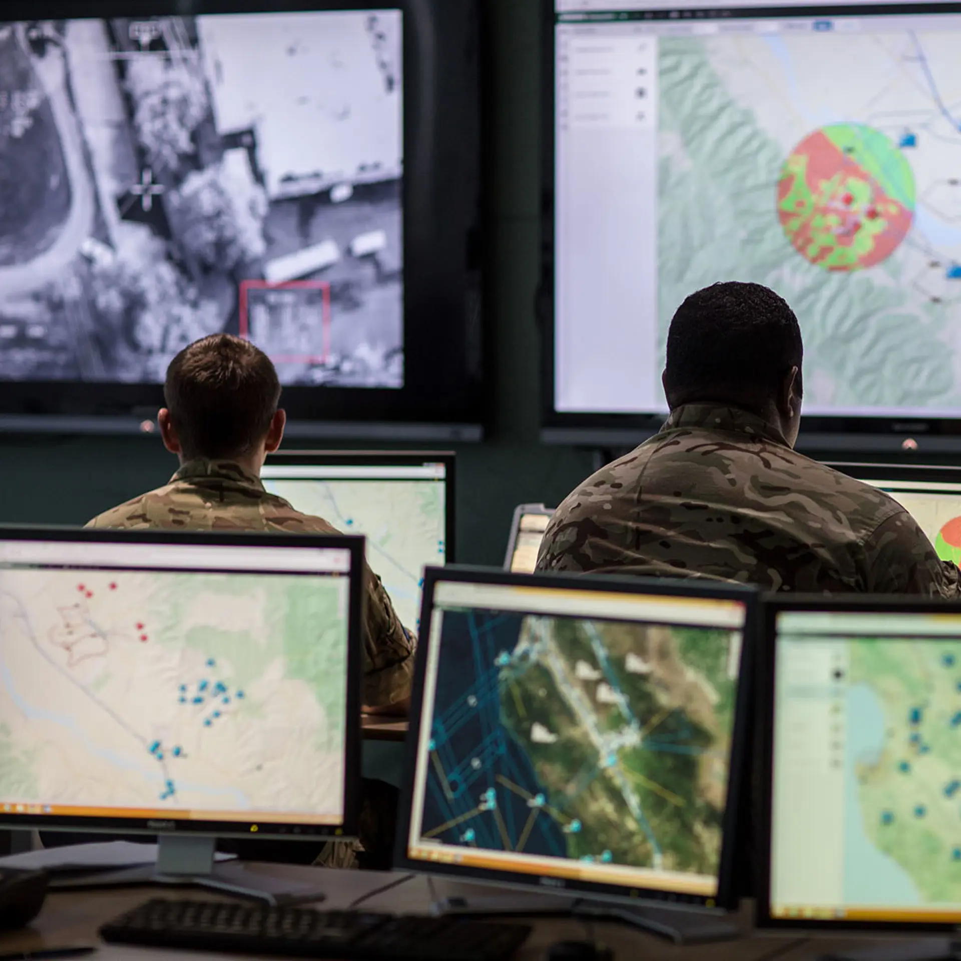 UK Commander Looking At Sitaware Map In HQ