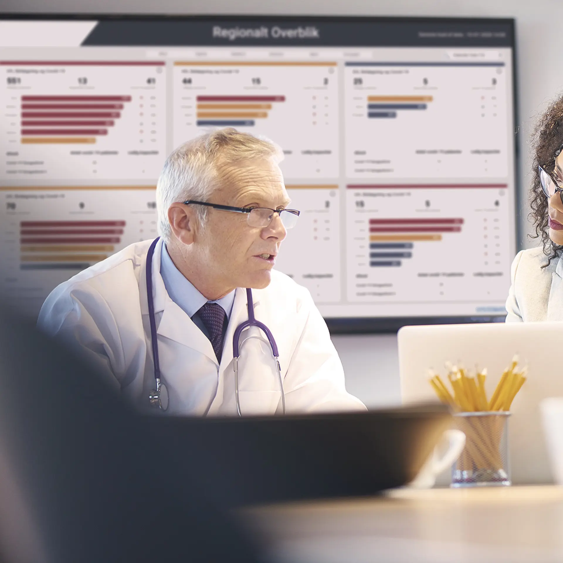 Doctor Talking With Business Woman