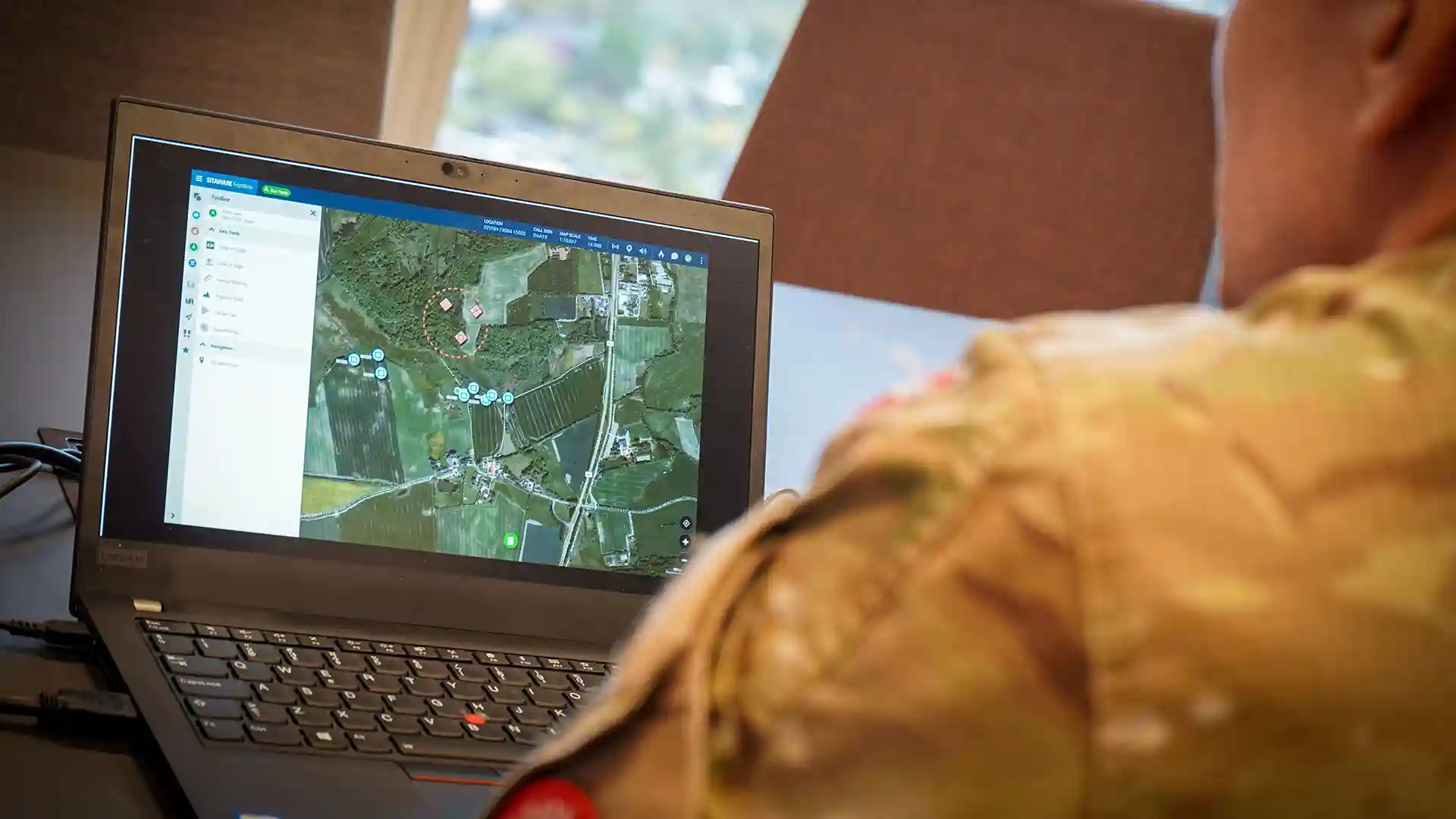 Soldier In Office Using Sitaware Aspire