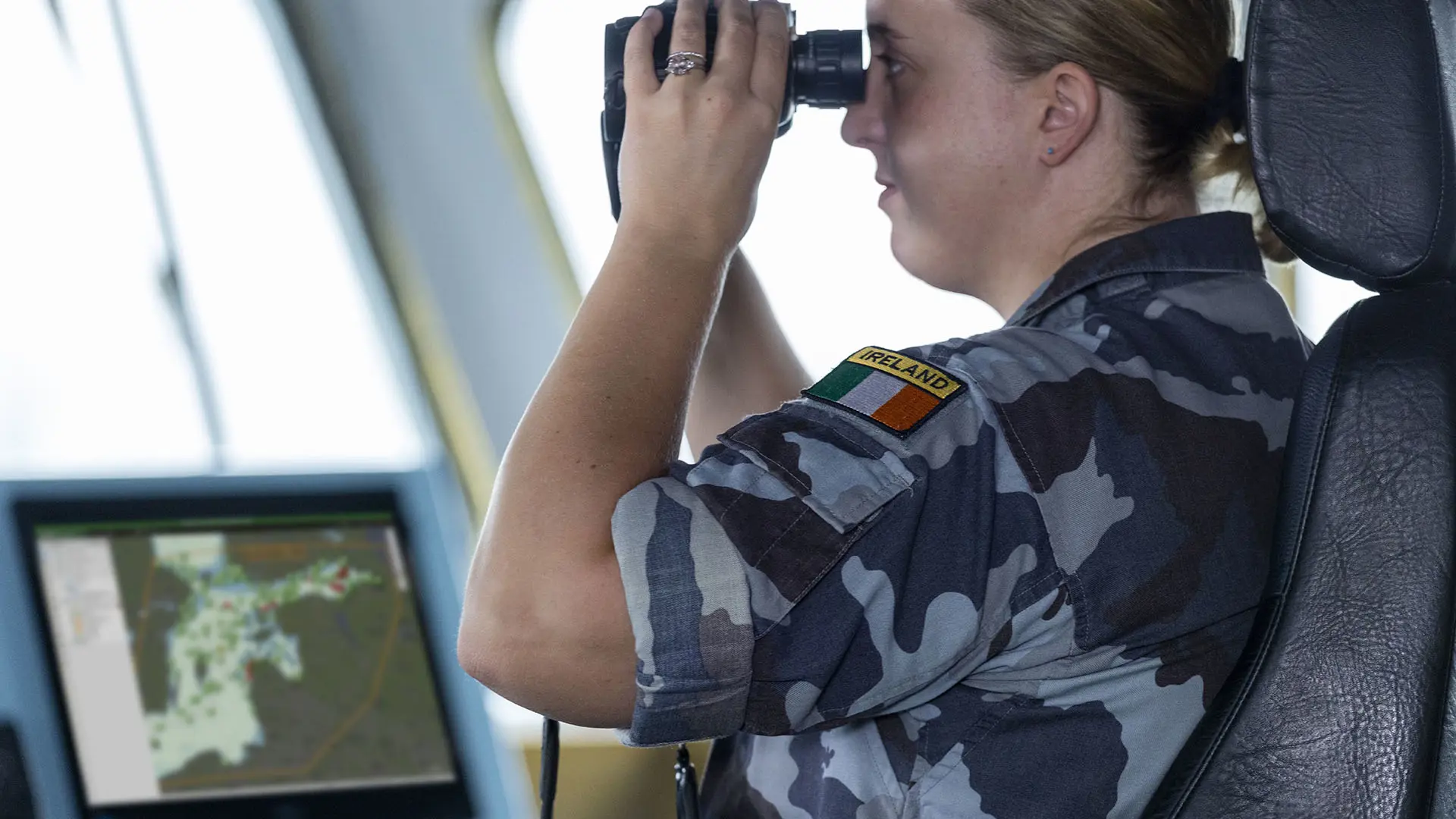 IE Navy Captain Looking Through Binoculars