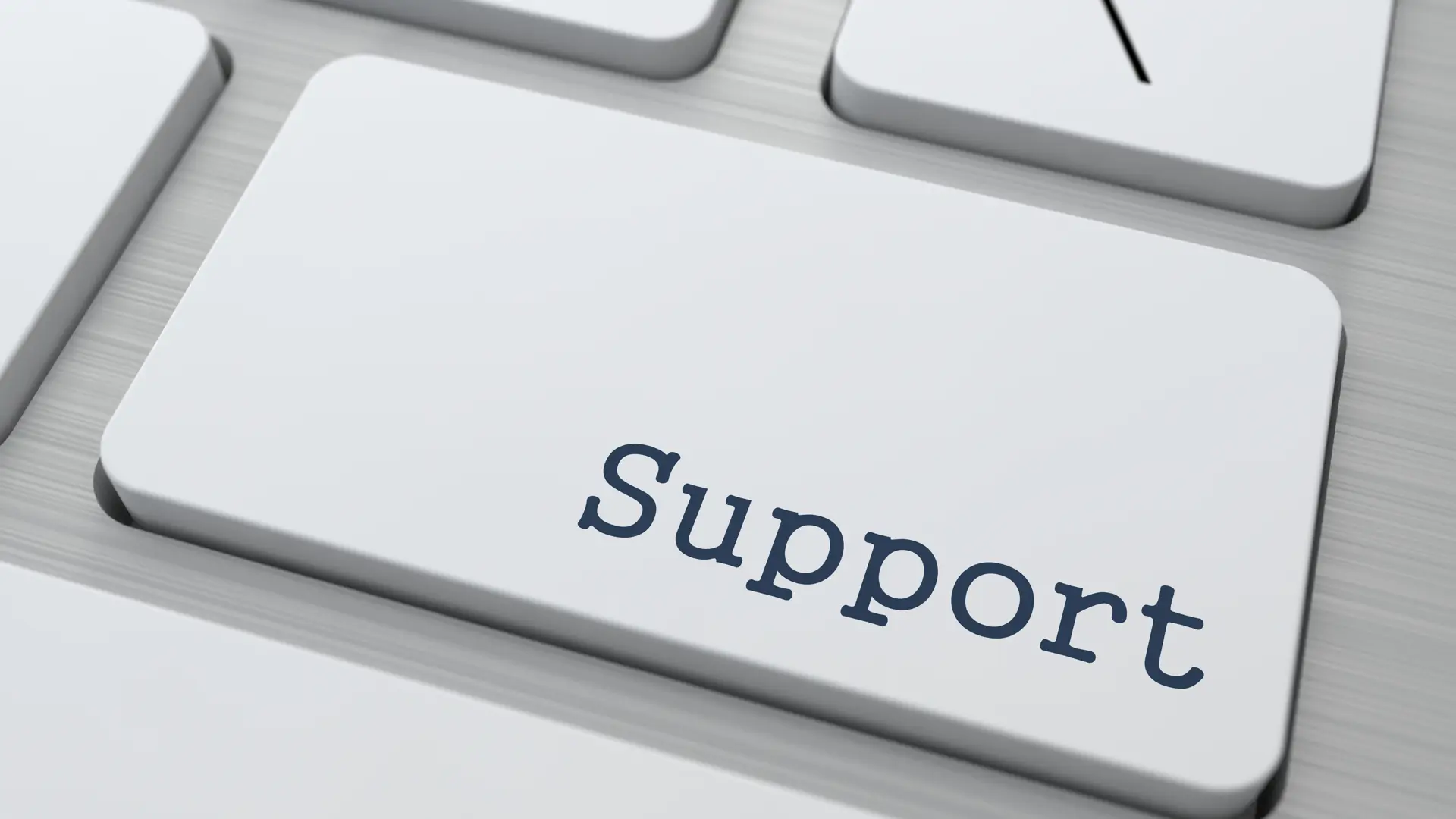 Knapp på tangentbordet som säger Support