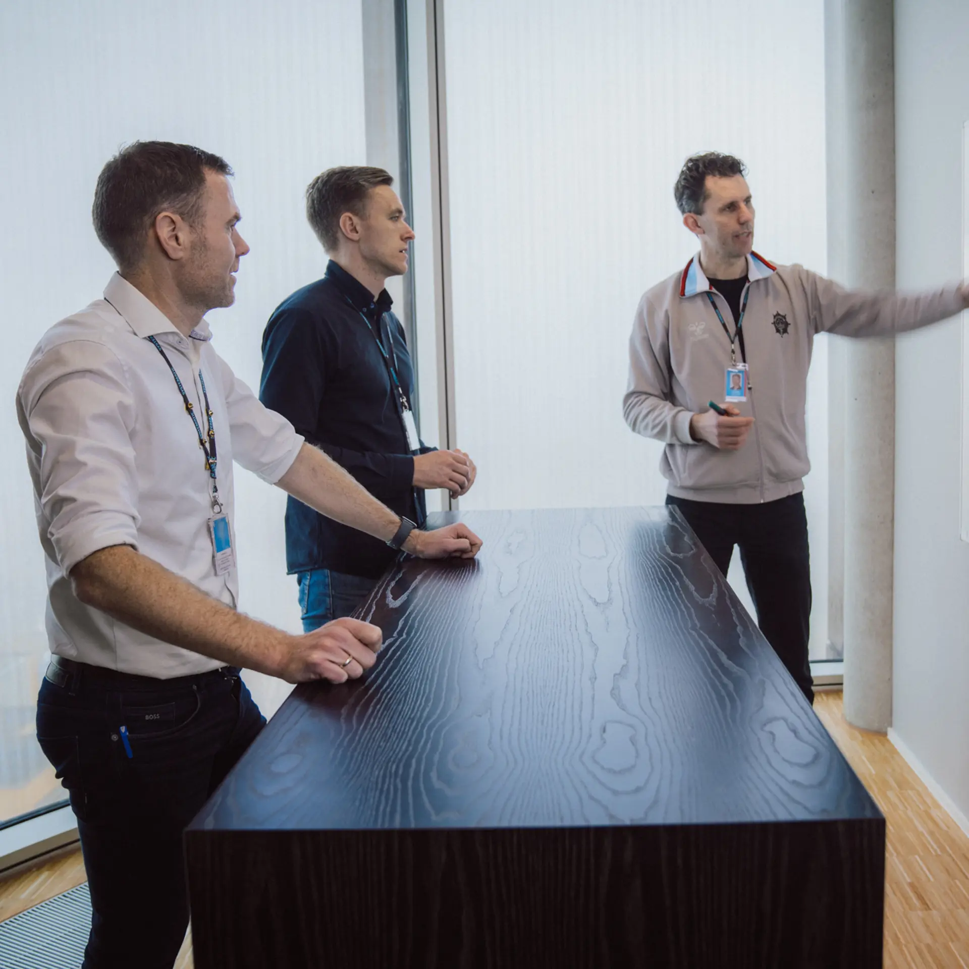 Employees at a whiteboard