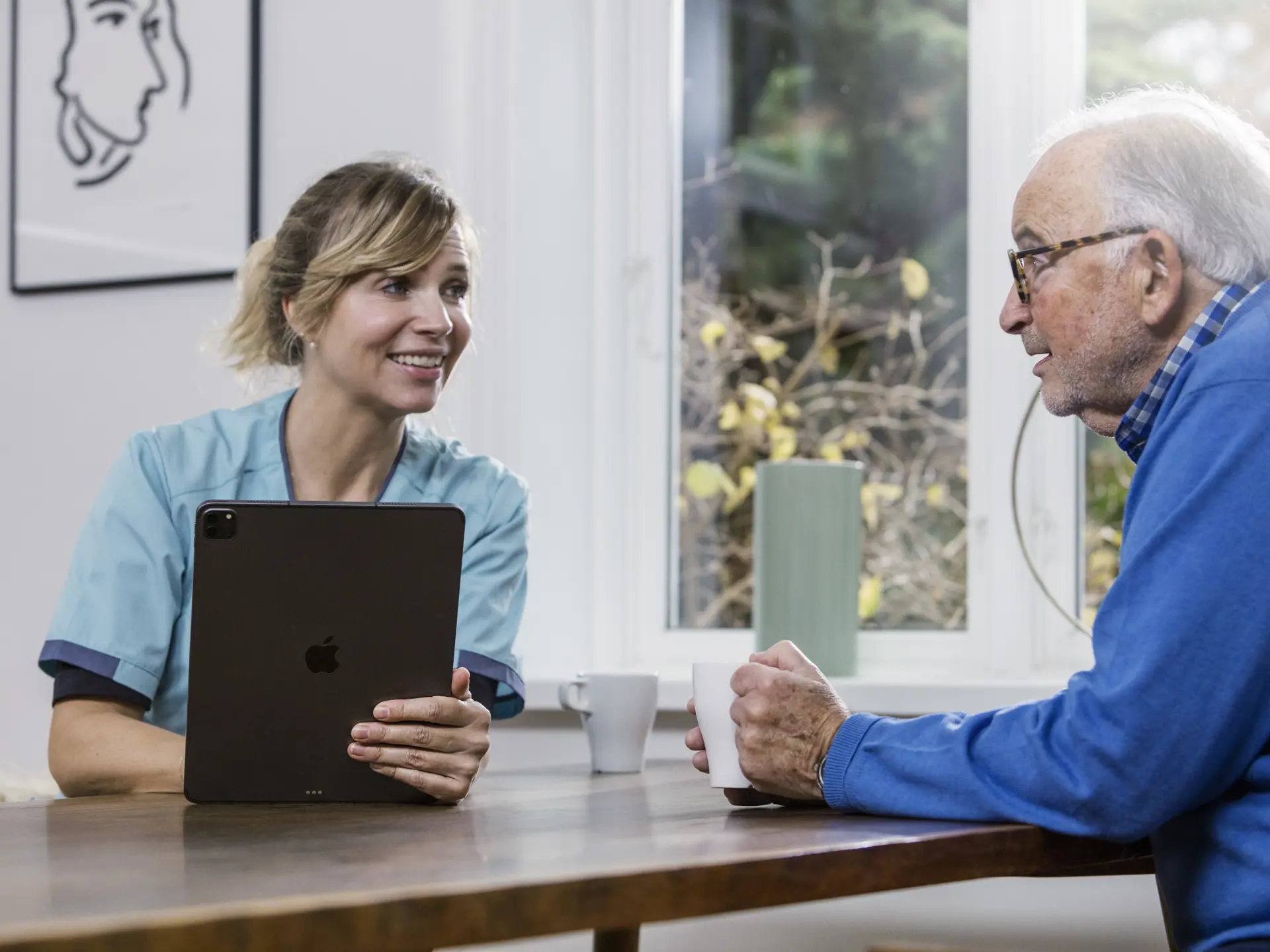 Healthcare professional visits citizens at home